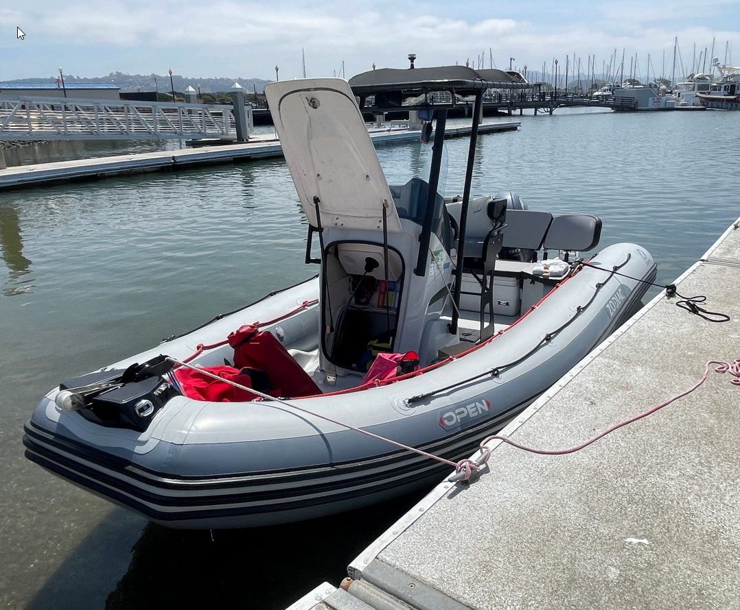 The Zodiac Pro Open 5.5 tied up at the dock